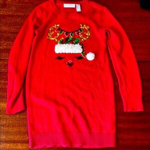 Red Christmas Sweater Dress with Sequin Reindeer Design.